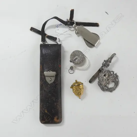 A vintage chantelain case (spectacles?), silver metal belt hook, sterling silver winding tape and a gilded thimble case.